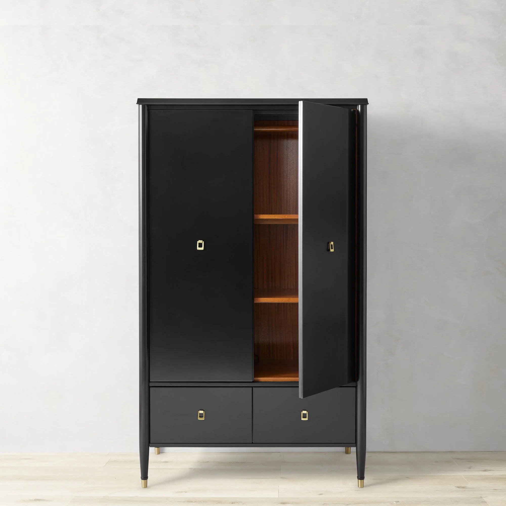 Armoire de rangement noire à double porte avec tiroir