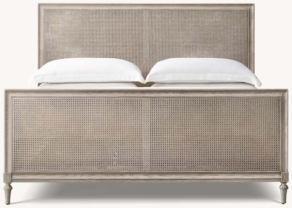 Lit de rotin et de bois avec pied de pied